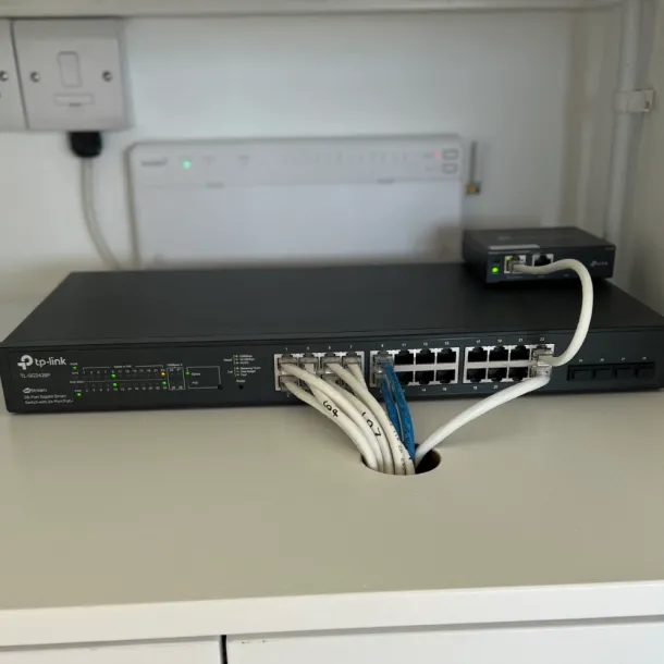 Garden Office Connectivity – Knutsford: "Discreet external cabling and dedicated data points for a high-speed remote working setup.