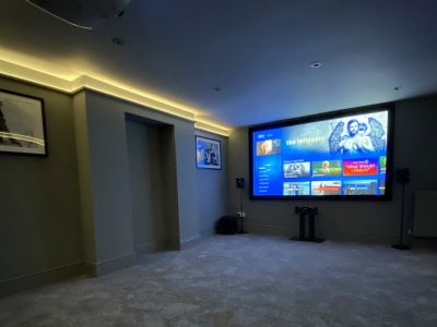 Surround sound cinema room with pelmet lighting